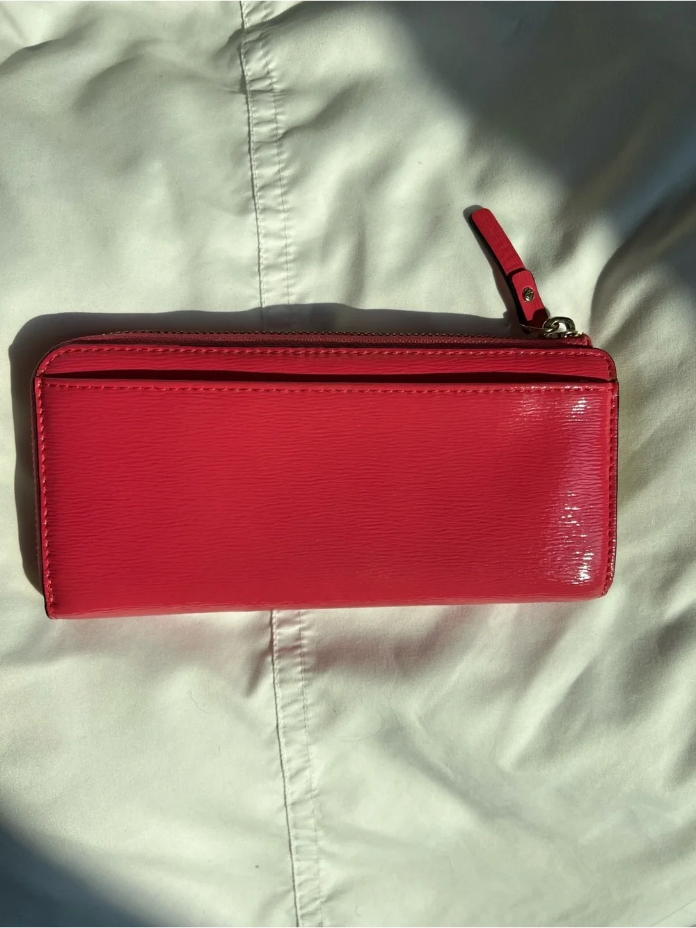 kate spade holly street Lacey zip-around wallet Coral/Pink
